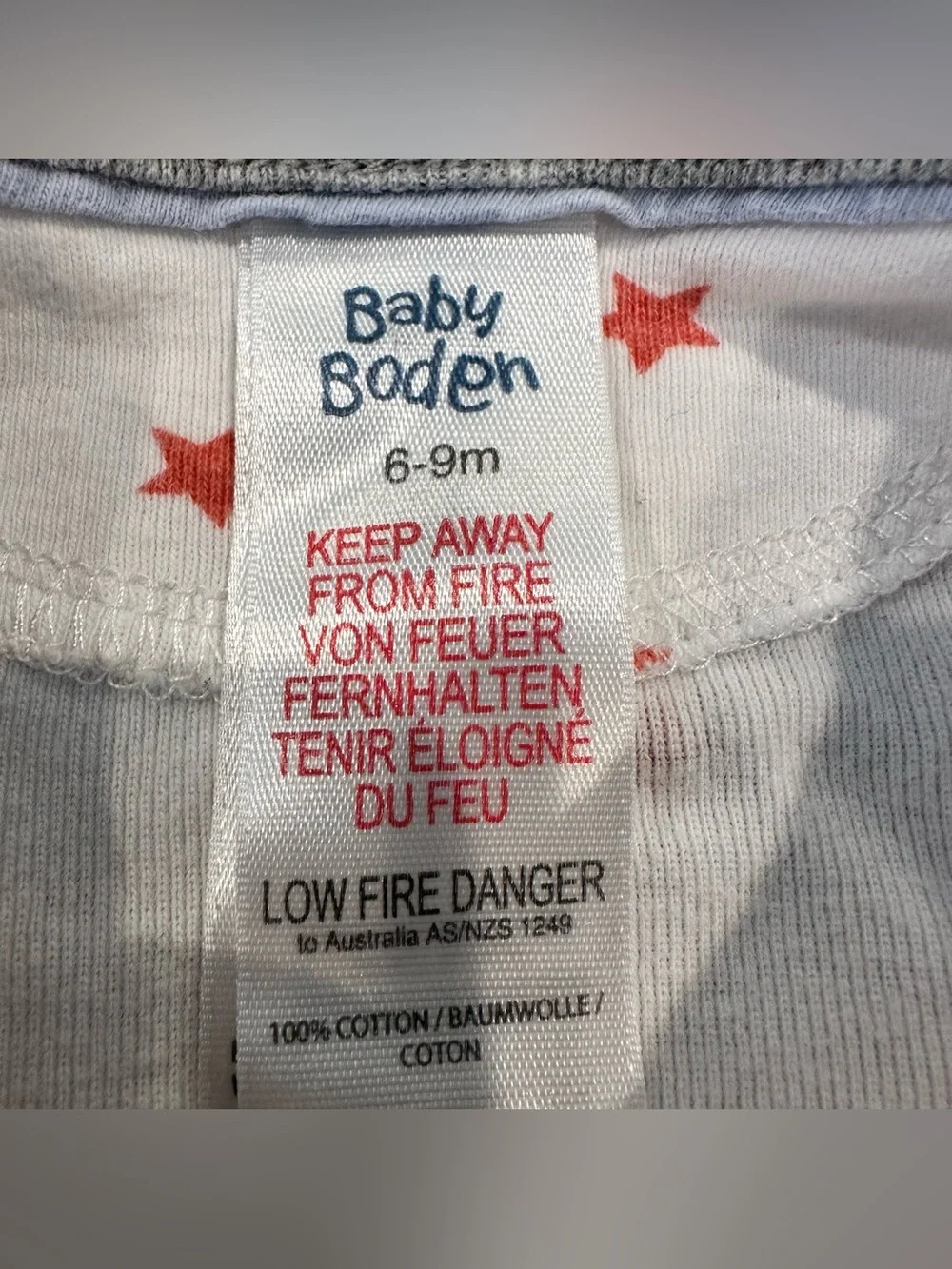 Mini Boden White Footed One-Piece with Red Star Print and Gray Trim Unisex 6-9